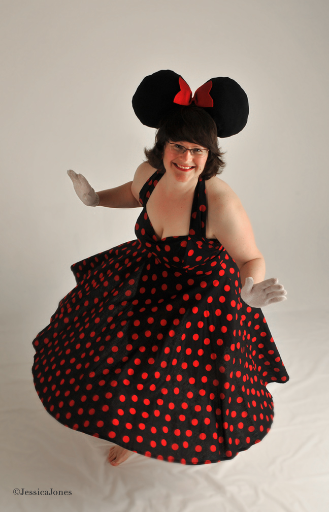 Photo of Colleen in black and red polka-dot dress
